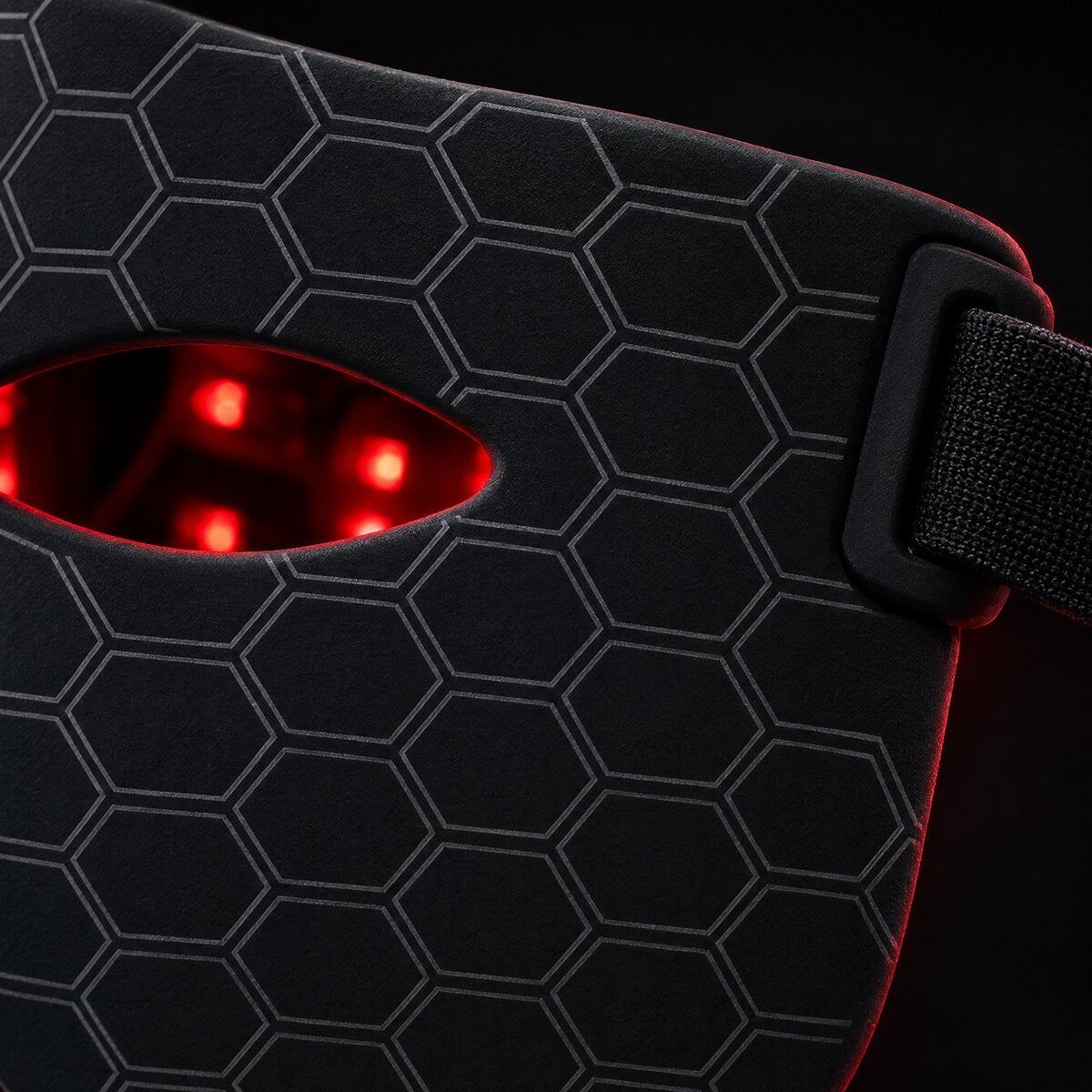 Close-up of the Mog Mask hexagon texture and strap